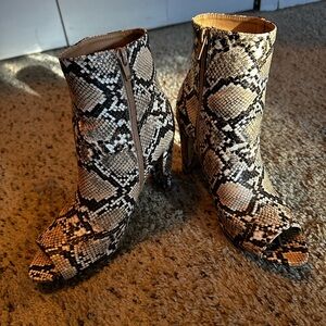 Open toe high heeled faux snakeskin ankle boots